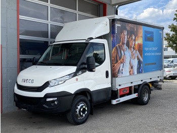 Véhicule utilitaire plateau baché IVECO Daily