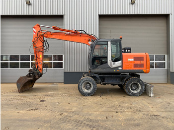 Pelle sur pneus HITACHI ZX140W-3