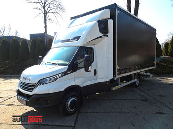 Véhicule utilitaire plateau baché IVECO Daily