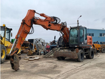 Pelle sur pneus HITACHI ZX140W-3