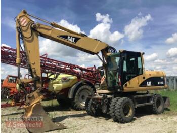 Pelle sur pneus CATERPILLAR M315C