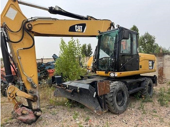 Pelle sur pneus CATERPILLAR M322D