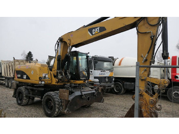 Pelle sur pneus CATERPILLAR 322