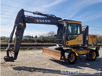 Pelle sur pneus VOLVO EW140C